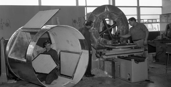 Basil Gum, Tony Haerl, and Herb Hanes construct casings for the 140-foot telescope's receiver