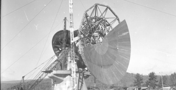Attaching the surface panels to the 140-foot telescope