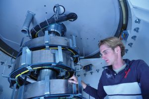 Lutz Stenvers inside an ALMA antenna