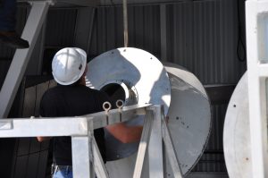 Engineer with the feed horn for the GBT's Prime Focus Receiver