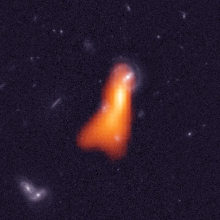 Radio-optical image of the galaxy J100054