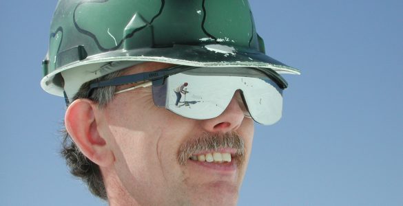 Telescope technician wearing safety sunglasses